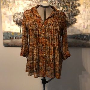 Pin tuck flows blouse in browns and a splash of black